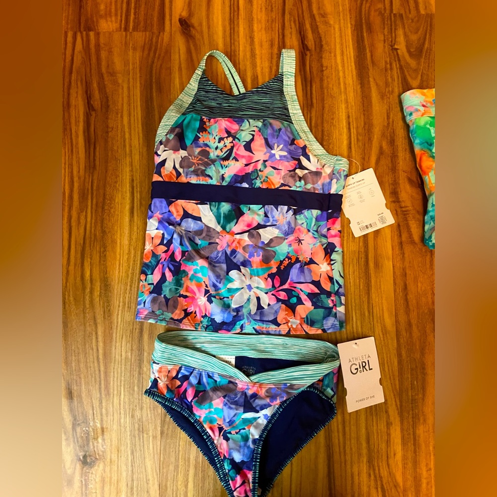 NWT tankini and extra surf shorts